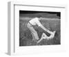 Young Couple Frolicking in Grass-Philip Gendreau-Framed Photographic Print