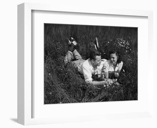 Young Couple Lying in the Grass-Philip Gendreau-Framed Photographic Print