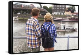 Young Couple on a Journey to Europe, Standing on the Bank of the Vistula, Rear View.-De Visu-Framed Stretched Canvas