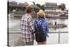 Young Couple on a Journey to Europe, Standing on the Bank of the Vistula, Rear View.-De Visu-Stretched Canvas