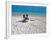 Young Couple on Beach Sitting in a Heart Shaped Imprint on the Sand, Maldives, Indian Ocean, Asia-Sakis Papadopoulos-Framed Photographic Print