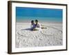 Young Couple on Beach Sitting in a Heart Shaped Imprint on the Sand, Maldives, Indian Ocean, Asia-Sakis Papadopoulos-Framed Photographic Print