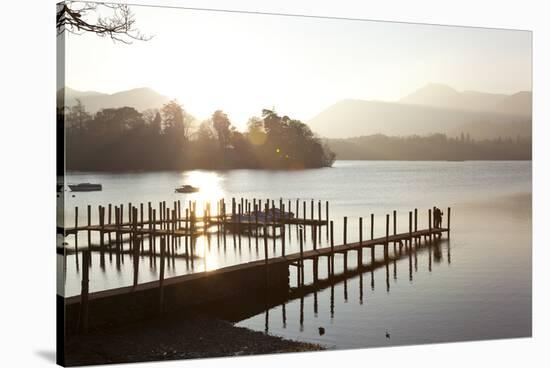 Young Couple on Pier, Sunset, Derwent Water, Cumbria, UK-Peter Adams-Stretched Canvas