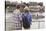 Young Couple on the River Bank in a European City (Rear View) Romantic Journey.-De Visu-Stretched Canvas