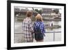 Young Couple on the River Bank in a European City (Rear View) Romantic Journey.-De Visu-Framed Photographic Print