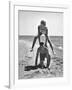 Young Couple Playing Leapfrog on the Beach-The Chelsea Collection-Framed Art Print