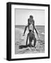 Young Couple Playing Leapfrog on the Beach-The Chelsea Collection-Framed Art Print