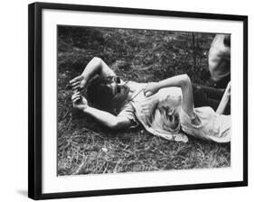Young Couple Relaxing During Woodstock Music Festival-Bill Eppridge-Framed Photographic Print