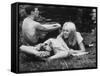 Young Couple Relaxing During Woodstock Music Festival-null-Framed Stretched Canvas