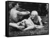 Young Couple Relaxing During Woodstock Music Festival-null-Framed Stretched Canvas