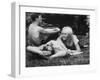 Young Couple Relaxing During Woodstock Music Festival-null-Framed Premium Photographic Print