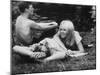 Young Couple Relaxing During Woodstock Music Festival-null-Mounted Premium Photographic Print