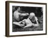 Young Couple Relaxing During Woodstock Music Festival-null-Framed Photographic Print