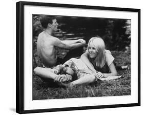 Young Couple Relaxing During Woodstock Music Festival-null-Framed Photographic Print