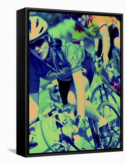 Young Couple Riding Bicycles-null-Framed Stretched Canvas