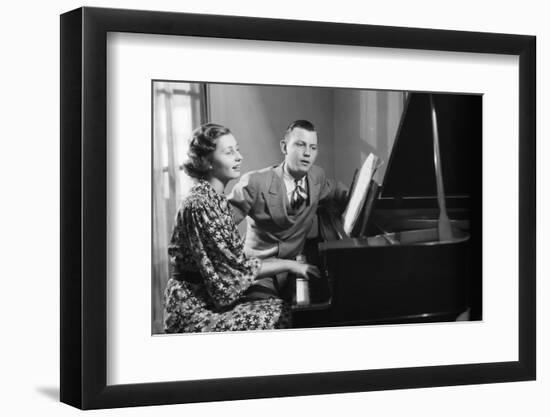 Young Couple Seated at Piano-Philip Gendreau-Framed Photographic Print