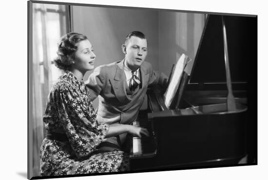 Young Couple Seated at Piano-Philip Gendreau-Mounted Photographic Print