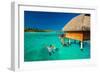 Young Couple Snorkeling from Hut over Blue Tropical Lagoon-Martin Valigursky-Framed Photographic Print
