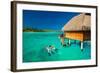 Young Couple Snorkeling from Hut over Blue Tropical Lagoon-Martin Valigursky-Framed Photographic Print