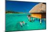 Young Couple Snorkeling from Hut over Blue Tropical Lagoon-Martin Valigursky-Mounted Photographic Print