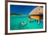 Young Couple Snorkeling from Hut over Blue Tropical Lagoon-Martin Valigursky-Framed Photographic Print