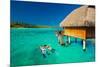 Young Couple Snorkeling from Hut over Blue Tropical Lagoon-Martin Valigursky-Mounted Photographic Print