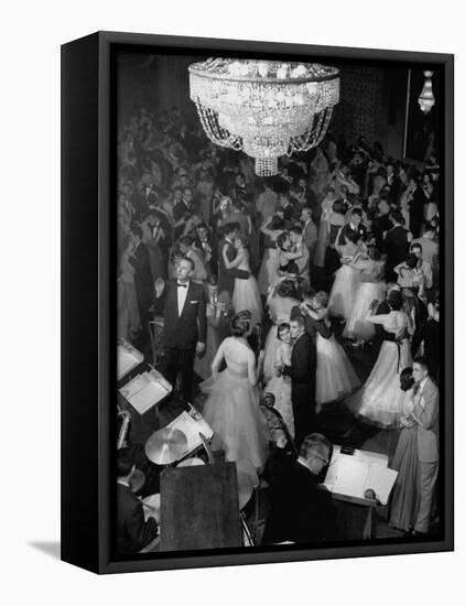 Young Couples at Formal Dance Dreamily Swaying on Crowded Floor of Dim, Chandelier-Lit Ballroom-Nina Leen-Framed Stretched Canvas