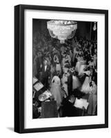 Young Couples at Formal Dance Dreamily Swaying on Crowded Floor of Dim, Chandelier-Lit Ballroom-Nina Leen-Framed Photographic Print