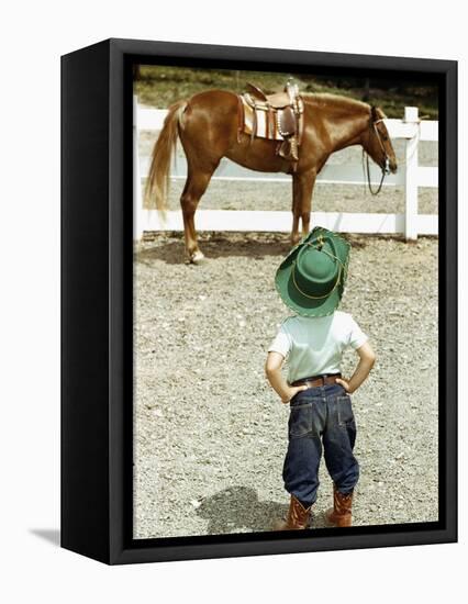 Young Cowboy Looking at Horse-William P. Gottlieb-Framed Stretched Canvas