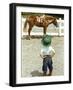 Young Cowboy Looking at Horse-William P. Gottlieb-Framed Photographic Print