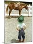 Young Cowboy Looking at Horse-William P. Gottlieb-Mounted Photographic Print