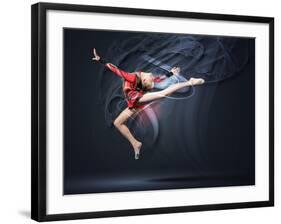 Young Cute Woman In Gymnast Suit Show Athletic Skill On Black Background-Sergey Nivens-Framed Art Print