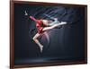 Young Cute Woman In Gymnast Suit Show Athletic Skill On Black Background-Sergey Nivens-Framed Art Print