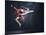 Young Cute Woman In Gymnast Suit Show Athletic Skill On Black Background-Sergey Nivens-Mounted Art Print