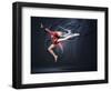 Young Cute Woman In Gymnast Suit Show Athletic Skill On Black Background-Sergey Nivens-Framed Art Print