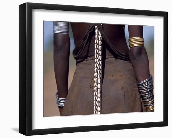 Young Dassanech Girl Wears a Leather Skirt, Metal Bracelets, Amulets and Bead Necklaces, Ethiopia-John Warburton-lee-Framed Premium Photographic Print
