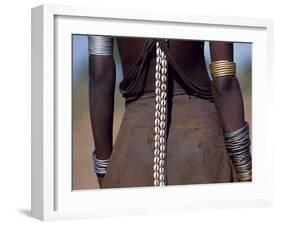 Young Dassanech Girl Wears a Leather Skirt, Metal Bracelets, Amulets and Bead Necklaces, Ethiopia-John Warburton-lee-Framed Photographic Print