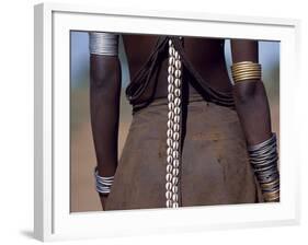 Young Dassanech Girl Wears a Leather Skirt, Metal Bracelets, Amulets and Bead Necklaces, Ethiopia-John Warburton-lee-Framed Photographic Print