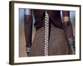 Young Dassanech Girl Wears a Leather Skirt, Metal Bracelets, Amulets and Bead Necklaces, Ethiopia-John Warburton-lee-Framed Photographic Print