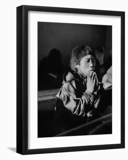 Young Eskimo Boy Attending Church, Praying During Church Services-null-Framed Photographic Print