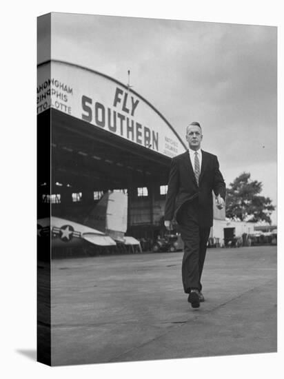 Young Exec Wearing a Brooks Brothers Type of Suit Walking around an Airport-null-Stretched Canvas