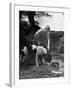 Young Farm Boy Watching His Dog Sniff a Large Turtle at the Pond-Myron Davis-Framed Photographic Print