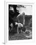 Young Farm Boy Watching His Dog Sniff a Large Turtle at the Pond-Myron Davis-Framed Photographic Print