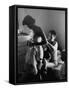 Young Father Helping His Wife Get Dressed as Their Sons Look On-Mark Kauffman-Framed Stretched Canvas