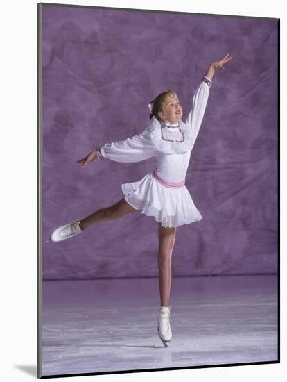 Young Female Figure Skater-null-Mounted Photographic Print