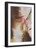 Young Female Holding a Red Leaf to Her Lips-Carolina Hernandez-Framed Photographic Print