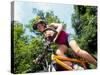 Young Female Recreational Mountain Biker Riding in the Forest-null-Stretched Canvas