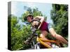 Young Female Recreational Mountain Biker Riding in the Forest-null-Stretched Canvas