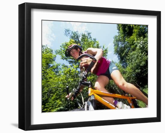 Young Female Recreational Mountain Biker Riding in the Forest-null-Framed Photographic Print