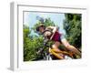 Young Female Recreational Mountain Biker Riding in the Forest-null-Framed Photographic Print